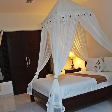 Dangin Mangkalan Homestay موندوغْ الغرفة الصورة