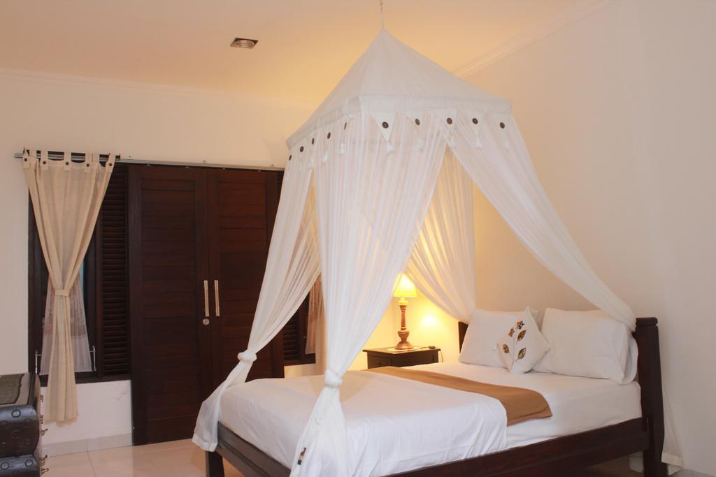Dangin Mangkalan Homestay موندوغْ الغرفة الصورة