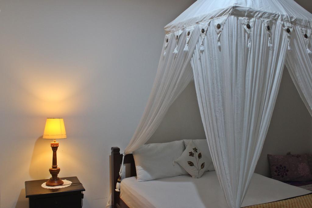 Dangin Mangkalan Homestay موندوغْ الغرفة الصورة