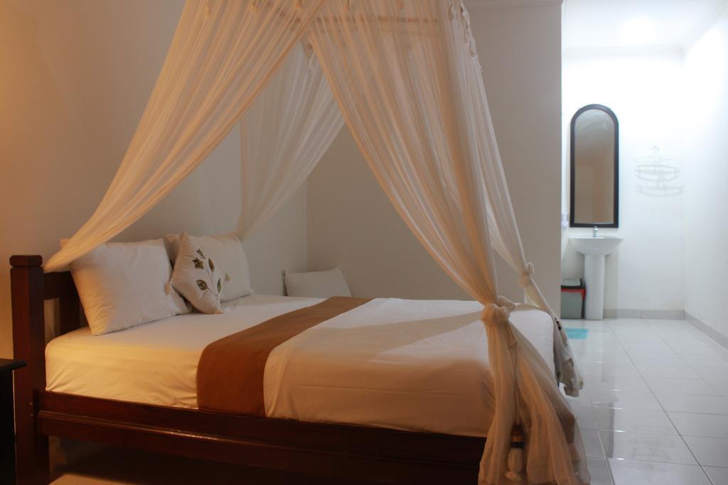 Dangin Mangkalan Homestay موندوغْ الغرفة الصورة